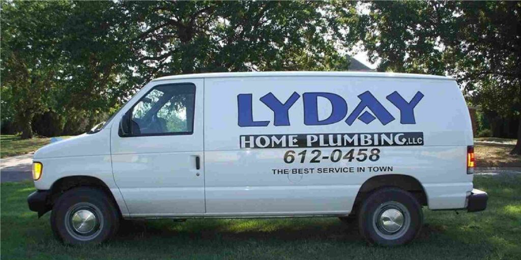 Plumber performing professional drain cleaning.